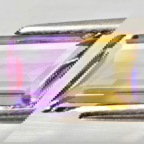 Natural Bi Color Ametrine 1.87 Ct. Octagon Shape 10 x 6.1 Mm Gemstone From Bolivia: Product ID: 800408371 Product Name: Natural Ametrine Weight: 1.87 CT. Size: 10 x 6.1 x 3.7 MM. Shape: Octagon Color: Bi Color Clarity:VSI - SI1 Luster: Good Gems Origin: Bolivia Treatment: Unheated Cr