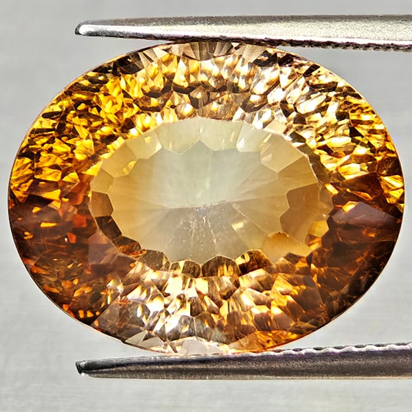 Natural Imperial Topaz 15.42 Ct. Oval Concave Cut 13.2 x 16.5 Mm Gemstone From Brazil: Product ID: 807168264 Product Name: Natural Topaz Weight: 15.42 CT. Size: 13.2 x 16.5 x 9.5 MM. Shape: Oval Concave Cut Color: Imperial Clarity:VSI Luster: Very Good Gems Origin: Brazil Treatment: Unh