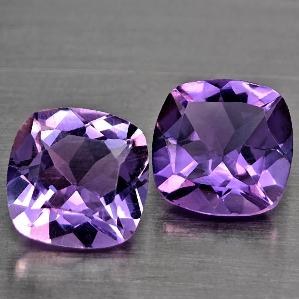 Natural Purple Amethyst 1.39 Ct. 2 Pcs Cushion Shape 6.1 Mm Gemstone From Brazil: Product ID: 800325568 Product Name: Natural Amethyst Weight: 1.39 CT. Size: 6.1 x 6.1 x 3.5 MM. Shape: Cushion Shape Color: Purple Clarity:SI1 Luster: Good Gems Origin: Brazil Treatment: Unheated Crys