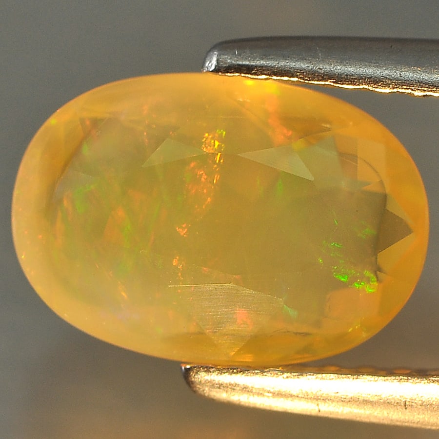 Natural Multi Color Opal 1.49 Ct. Oval Cabochon Shape 9.9 x 6.9 Mm Gemstone from Ethiopia (1 of 3)