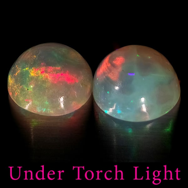 Natural Multi Color Opal 1.87 Ct. 2 Pcs Round Cabochon Shape 7.1 Mm Gemstones From Ethiopia: Product ID: 818728245 Product Name: Natural Opal Weight: 1.87 CT. Size: 7.1 x 7.1 x 4.2 MM. Shape: Round Color: Multi-Color Clarity:Semi - Transparent Luster: Good Gems Origin: Ethiopia Treatment: Unh