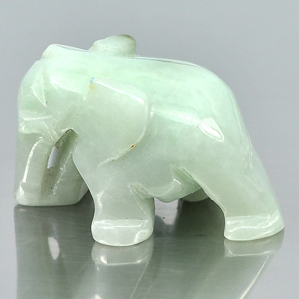 Natural Green Jade 73.21 Ct. Elephant Carving 30 x 19 Mm Gemstone: Product ID: 819812702 Product Name: Natural Jade Weight: 73.21 CT. Size: 30 x 19 x 17 MM. Shape: Elephant Carving Color: Green Clarity:Opaque Luster: Good Gems Origin: Thailand Treatment: Unheated Cry
