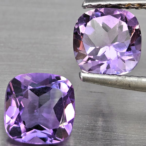 Natural Purple Amethyst 2.02 Ct. 2 Pcs Cushion Shape 6.4 Mm Gemstone From Brazil: Product ID: 800325566 Product Name: Natural Amethyst Weight: 2.02 CT. Size: 6.4 x 6.4 x 4.1 MM. Shape: Cushion Shape Color: Purple Clarity:SI1 Luster: Good Gems Origin: Brazil Treatment: Unheated Crys