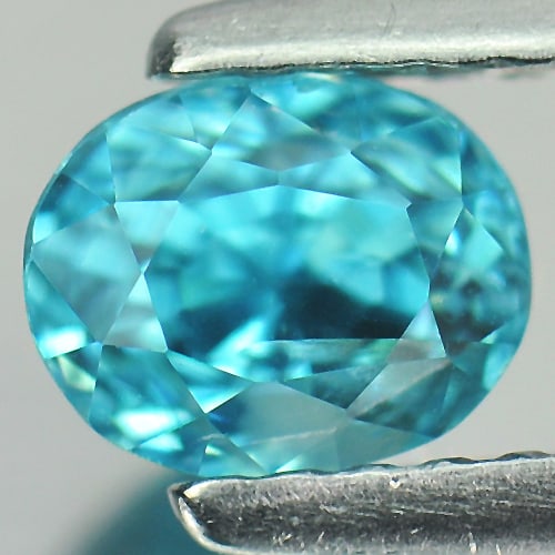 Natural Blue Zircon 1.10 Ct. Oval Shape 6.1 x 5.2 Mm. Gemstone From Cambodia: Product ID: 807711789 Product Name: Natural Zircon Weight: 1.10 CT. Size: 6.1 x 5.2 x 3.6 MM. Shape: Oval Color: Blue Clarity:VSI Luster: Good Gems Origin: Cambodia Treatment: Heated Crystal Structure