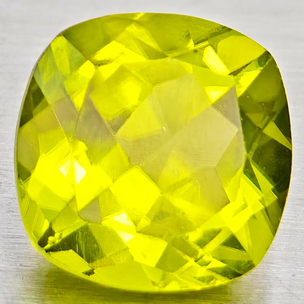 Natural Green Peridot 1.67 Ct. Cushion Shape 7.1 Mm Gemstone From Pakistan: Product ID: 805317252 Product Name: Natural Peridot Weight: 1.67 CT. Size: 7.1 x 7.1 x 4.6 MM. Shape: Cushion Shape Color: Green Clarity:VSI - SI1 Luster: Good Gems Origin: Pakistan Treatment: Unheate