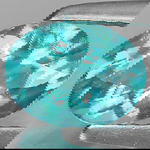 Natural Paraiba Color Apatite 0.84 Ct. Oval Shape 7 x 5.3 Mm Gemstone from Tanzania: Product ID: 800606100 Product Name: Natural Apatite Weight: 0.84 CT. Size: 7 x 5.3 x 3.5 MM. Shape: Oval Color: Neon Blue Clarity:VSI Luster: Good Gems Origin: Tanzania Treatment: Unheated Crystal Str