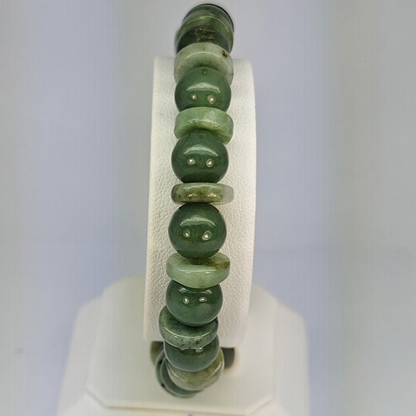 Natural Green Jade Beads Stretch Bracelet 164.03 Ct. Gemstone From Thailand: Product ID: 818102719 Product Name: Natural Jade Weight: 164.03 CT. Size: 2.5 x 9.4 MM. Shape: Mix Cabochon Color: Multi-Color Green Clarity:Opaque Luster: Good Gems Origin: Thailand Treatment: Unheat