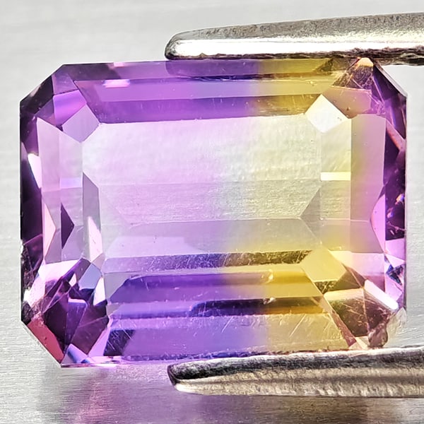 Natural Bi Color Ametrine 2.52 Ct. Octagon Shape 9 x 7.1 Mm Gemstone From Bolivia: Product ID: 800408317 Product Name: Natural Ametrine Weight: 2.52 CT. Size: 9 x 7.1 x 5.2 MM. Shape: Octagon Color: Bi Color Clarity:VSI Luster: Good Gems Origin: Bolivia Treatment: Unheated Crystal S