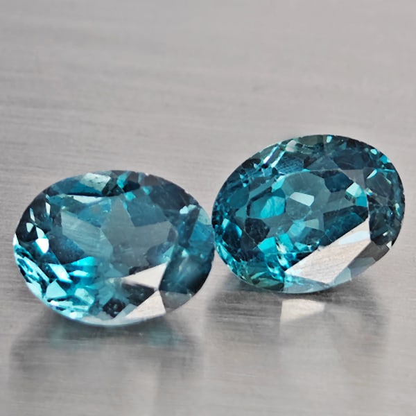 Natural London Blue Topaz 4.99 Ct. 2 Pcs Oval Shape 9 x 7.2 Mm Gemstones From Brazil: Product ID: 807168917 Product Name: Natural Blue Topaz Weight: 4.99 CT. Size: 9 x 7.2 x 5.3 MM. Shape: Oval Color: London Blue Clarity:SI1 Luster: Good Gems Origin: Brazil Treatment: Treated Crystal S