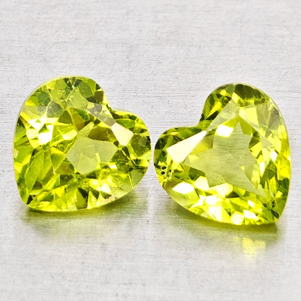 Natural Green Peridot 1.92 Ct. 2 Pcs Heart Shape 6.1 x 6.1 Mm Gemstones From Pakistan: Product ID: 805317345 Product Name: Natural Peridot Weight: 1.92 CT. Size: 6.1 x 6.1 x 3.7 MM. Shape: Heart Shape Color: Green Clarity:VSI - SI1 Luster: Good Gems Origin: Pakistan Treatment: Unheated