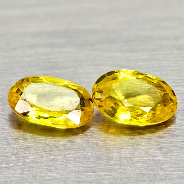 Natural Yellow Songea Sapphire 0.99 Ct. 2 Pcs Oval Shape Gemstones From Tanzania: Product ID: 806162331 Product Name: Natural Pink Sapphire Weight: 0.99 CT. Size: 6 x 4.1 x 2.5 to 6 x 3.9 x 1.9 MM. Shape: Oval Color: Yellow Clarity:VSI Luster: Good Gems Origin: Tanzania Treatment: