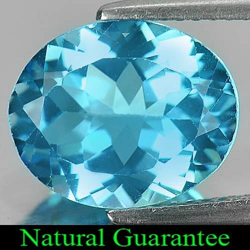 Natural Swiss Blue Topaz 5.12 Ct. Oval Shape 12 x 10 Mm Gemstone from Brazil: Product ID: 807161098 Product Name: Natural Blue Topaz Weight: 5.12 CT. Size: 12 x 10 x 5.8 MM. Shape: Oval Color: Swiss Blue Clarity:VSI Luster: Good Gems Origin: Brazil Treatment: Treated Crystal St