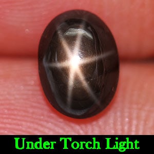 Natural Black Star Sapphire 2.17 Ct. Oval Cabochon Shape 7.8 x 5.8 Mm Gemstone from Thailand: Product ID: 806145349 Product Name: Natural Star Sapphire Weight: 2.17 CT. Size: 7.8 x 5.8 x 4.5 MM. Shape: Oval Cabochon Color: Black Clarity:Opaque Luster: Good 6 Rays Star Gems Origin: Thailand Tre