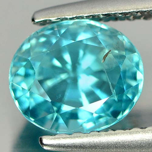 Natural Blue Zircon 1.97 Ct. Oval Shape 7 x 6.1 Mm Gemstone from Cambodia: Product ID: 807720735 Product Name: Natural Zircon Weight: 1.97 CT. Size: 7 x 6.1 x 4.9 MM. Shape: Oval Color: Blue Clarity:SI Luster: Good Gems Origin: Cambodia Treatment: Heated Crystal Structure: T