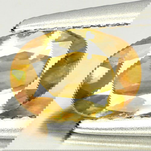Natural Yellow Zircon 0.98 Ct. Oval Shape 7 x 5 Mm. Gemstone From Cambodia: Product ID: 807728779 Product Name: Natural Zircon Weight: 0.98 CT. Size: 7 x 5 x 2.5 MM. Shape: Oval Color: Yellow Clarity:SI1 Luster: Good Gems Origin: Cambodia Treatment: Heated Crystal Structure:
