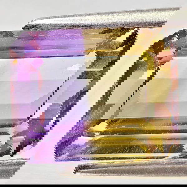 Natural Bi Color Ametrine 3.62 Ct. Octagon Shape 9.8 x 7.8 Mm. Gemstone From Bolivia: Product ID: 800408401 Product Name: Natural Ametrine Weight: 3.62 CT. Size: 9.8 x 7.8 x 6.2 MM. Shape: Octagon Color: Bi Color Clarity:VSI Luster: Good Gems Origin: Bolivia Treatment: Unheated Crystal