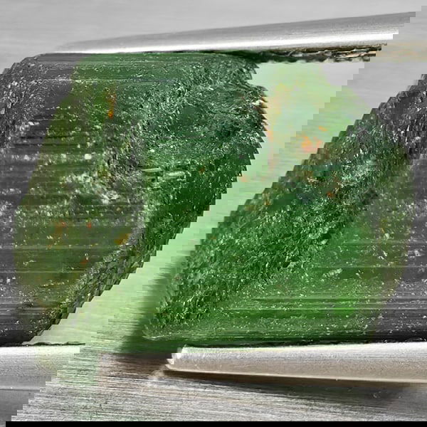 Natural Green Tourmaline 5.63 Ct. Rough Shape 9.4 x 8 Mm Gemstone from Nigeria: Product ID: 597200043 Product Name: Natural Tourmaline Weight: 5.63 CT. Size: 9.4 x 8 MM. Shape: Rough Mixed Shape Color: Green Clarity:None Luster: Good Gems Origin: Nigeria Treatment: Unheated Cryst