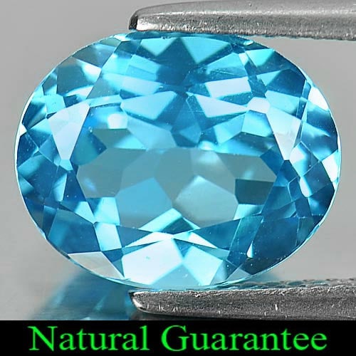 Natural Swiss Blue Topaz 4.85 Ct. Oval Shape 12 x 10 Mm Gemstone from Brazil: Product ID: 807161081 Product Name: Natural Blue Topaz Weight: 4.85 CT. Size: 12 x 10 x 6 MM. Shape: Oval Color: Swiss Blue Clarity:VVS Luster: Good Gems Origin: Brazil Treatment: Treated Crystal Stru
