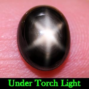 Natural Black Star Sapphire 2.94 Ct. Oval Cabochon Shape 8.7 x 7 Mm Gemstone from Thailand: Product ID: 806137571 Product Name: Natural Star Sapphire Weight: 2.94 CT. Size: 8.7 x 7 x 4.2 MM. Shape: Oval Cabochon Color: Black Clarity:Opaque Luster: Good 6 Rays Star Gems Origin: Thailand Treat
