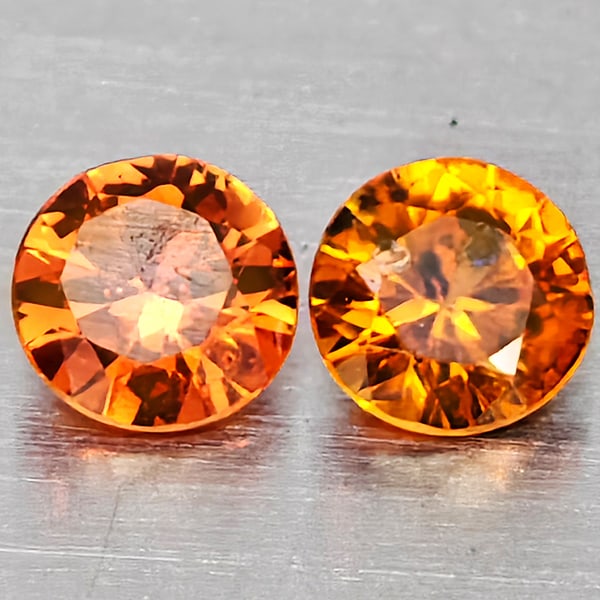 Natural Orange Yellow Sapphire 0.18 Ct. 2 Pcs Round Diamond Cut 2.8 Mm Gemstones From Thailand: Product ID: 806162863 Product Name: Natural Yellow Sapphire Weight: 0.18 CT. Size: 2.8 x 2.8 x 1.8 MM. Shape: Round Diamond Cut Color: Orange Yellow Clarity:VSI Luster: Good Gems Origin: Thailand Trea