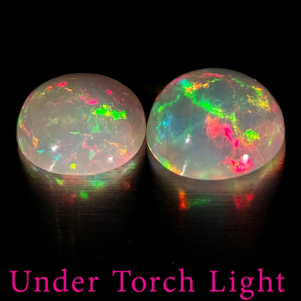 Natural Multi Color Opal 1.52 Ct. 2 Pcs Round Cabochon Shape 7.2 Mm Gemstones From Ethiopia: Product ID: 818728215 Product Name: Natural Opal Weight: 1.52 CT. Size: 7.2 x 7.2 x 3.5 MM. Shape: Round Cabochon Color: Multi-Color Clarity:Semi - Transparent Luster: Good Gems Origin: Ethiopia Treat