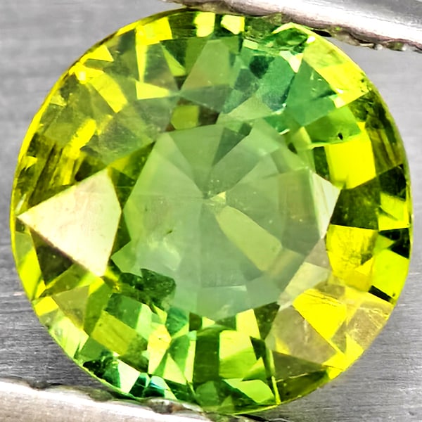 Natural Green Tourmaline 0.89 Ct. Round Shape 5.6 Mm Gemstone from Nigeria: Product ID: 807251113 Product Name: Natural Tourmaline Weight: 0.89 CT. Size: 5.6 x 5.6 x 3.4 MM. Shape: Round Color: Green Clarity:SI1 Luster: Good Gems Origin: Nigeria Treatment: Unheated Crystal St