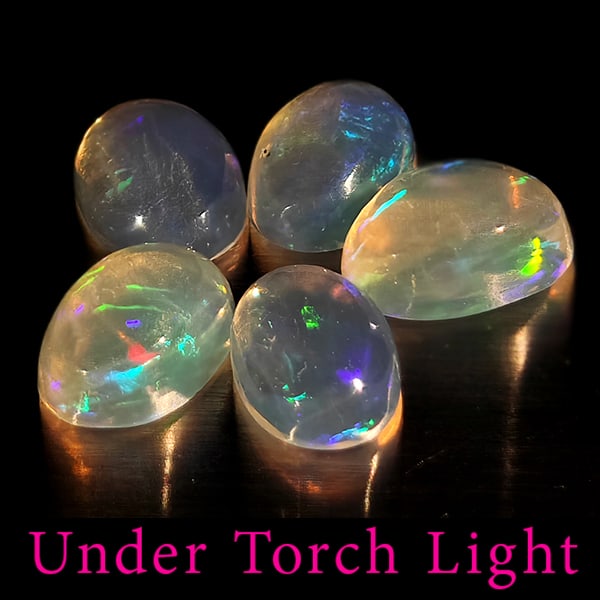 Natural Multi Color Opal 1.59 Ct. 5 Pcs Oval Cabochon Shape 6.1 x 4.1 Mm Gemstones From Ethiopia: Product ID: 818728116 Product Name: Natural Opal Weight: 1.59 CT. Size: 6.1 x 4.1 x 2.9 MM. Shape: Oval Cabochon Color: Multi-Color Clarity:Semi - Transparent Luster: Good Gems Origin: Ethiopia Treatm