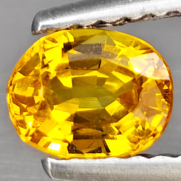 Natural Yellow Sapphire 0.70 Ct. Oval Shape 5.9 x 4.6 Mm Gemstone from Thailand: Product ID: 806163038 Product Name: Natural Yellow Sapphire Weight: 0.70 CT. Size: 5.9 x 4.6 x 3.1 MM. Shape: Oval Color: Yellow Clarity:VSI Luster: Good Gems Origin: Thailand Treatment: Heated Crysta