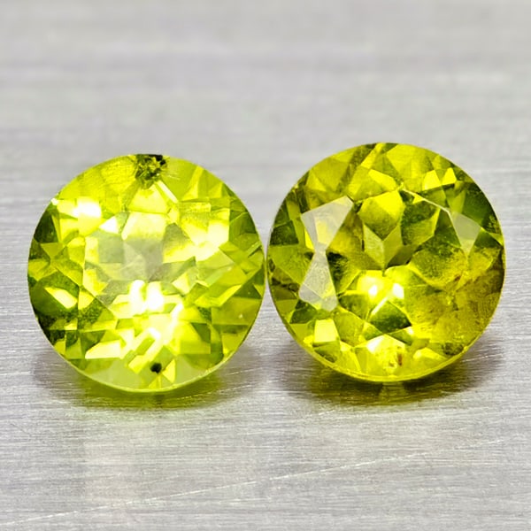 Natural Green Peridot 1.16 Ct. 2 Pcs. Round Shape 5 Mm. Gemstone From Pakistan: Product ID: 805317115 Product Name: Natural Peridot Weight: 1.14 CT. Size: 5 x 5 x 3.5 MM. Shape: Round Color: Green Clarity:VSI - SI1 Luster: Good Gems Origin: Pakistan Treatment: Unheated Crystal St