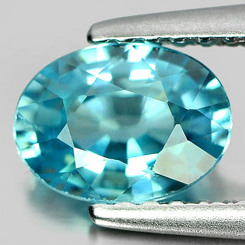Natural Blue Zircon 1.26 Ct. Clean Oval Shape 7.1 x 5.3 Mm. Gemstone From Cambodia: Product ID: 807710941 Product Name: Natural Zircon Weight: 1.26 CT. Size: 7.1 x 5.3 x 3.3 MM. Shape: Oval Color: Blue Clarity:IF Luster: Good Gems Origin: Cambodia Treatment: Heated Crystal Structure: