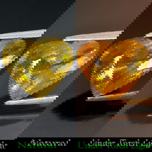 Natural Multi Color Titanium Sphene Red Spark 7.83 Ct. Heart Shape 14 x 11.8 Mm. Unheated Gemstone: Product ID: 806504145 Product Name: Natural Sphene Weight: 7.83 CT. Size: 14 x 11.8 x 7.7 MM. Shape: Heart Color: Multi Color With Red Spark Clarity:SI Luster: Adamantine Gems Origin: Mardagascar Trea