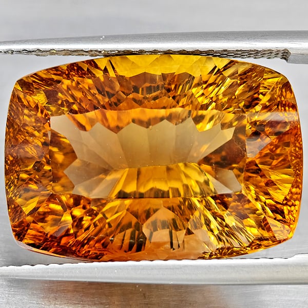 Natural Imperial Topaz 21.33 Ct. Cushion Concave Cut 18.6 x 13 Mm Gemstone From Brazil: Product ID: 807168627 Product Name: Natural Topaz Weight: 21.33 CT. Size: 18.6 x 13 x 10.5 MM. Shape: Cushion Concave Cut Color: Imperial Clarity:VSI Luster: Good Gems Origin: Brazil Treatment: Treate