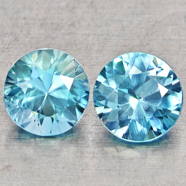 Natural Blue Zircon 1.27 Ct. 2 Pcs Round Diamond Cut 5 Mm Gemstones from Cambodia: Product ID: 807743053 Product Name: Natural Zircon Weight: 1.27 CT. Size: 5 x 5 x 3.1 MM. Shape: Round Diamond Cut Color: Blue Clarity:VSI Luster: Good Gems Origin: Cambodia Treatment: Heated Crystal