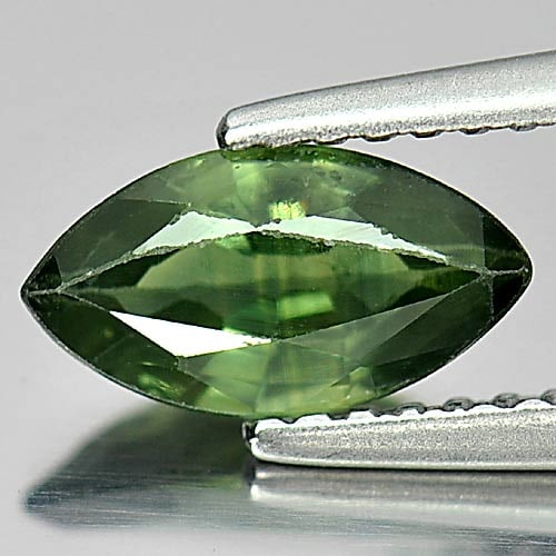 Natural Green Sapphire 1.05 Ct. Marquise Shape 9 x 4.9 Mm. Gemstone From Thailand: Product ID: 806158880 Product Name: Natural Green Sapphire Weight: 1.05 CT. Size: 9 x 4.9 x 3.1 MM. Shape: Marquise Color: Green Clarity:VSI Luster: Good Gems Origin: Thailand Treatment: Heated Crysta