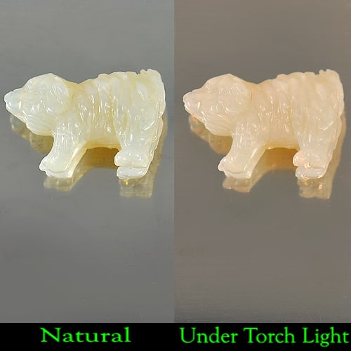 Natural Multi Color Opal 18.03 Ct. Dog Carving 23 x 14.9 Mm. Unheated Gemstone From Australia: Product ID: 818722515 Product Name: Natural Opal Carving Weight: 18.03 CT. Size: 23 x 14.9 x 10.8 MM. Shape: Dog Carving Color: Multi Color Clarity:Semi - Transparent Luster: Strong Iridescent Gems Or