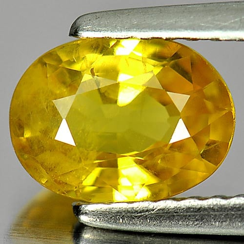 Natural Yellow Sapphire 1.46 Ct. Oval Shape 8.1 x 6.1 Mm Gemstone From Thailand: Product ID: 806153985 Product Name: Natural Yellow Sapphire Weight: 1.46 CT. Size: 8.1 x 6.1 x 3.5 MM. Shape: Oval Color: Yellow Clarity:VSI Luster: Very Good Gems Origin: Thailand Treatment: Heated C