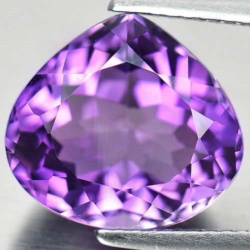 Natural Purple Amethyst 6.06 Ct. Pear Shape 12.8 x 11.6 Mm. Gemstone From Brazil: Product ID: 800325104 Product Name: Natural Amethyst Weight: 6.06 CT. Size: 12.8 x 11.6 x 7.8 MM. Shape: Pear Color: Purple Clarity:VVS Luster: Very Good Gems Origin: Brazil Treatment: Unheated Crysta