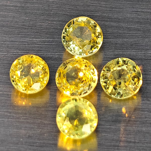 Natural Greenish Yellow Titanium Sphene Rainbow Spark 1.31 Ct. 5 Pcs Round Shape 3.7 Mm Gemstones: Product ID: 806509341 Product Name: Natural Sphene Weight: 1.31 CT. Size: 3.7 x 3.7 x 2.5 MM. Shape: Round Shape Color: Greenish Yellow Titanium Ranibow Spark Clarity:SI1 Luster: Good Gems Origin: Mad