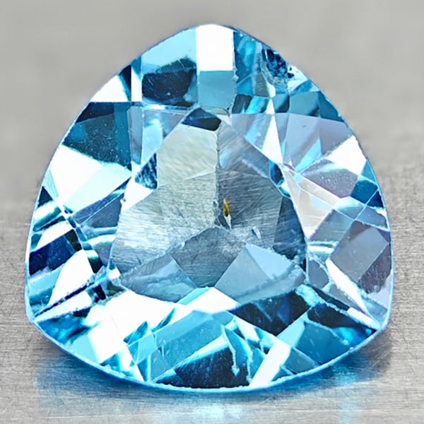 Natural Swiss Blue Topaz 3.29 Ct. Trilliant Shape 10 Mm. Gemstone From Brazil: Product ID: 807167873 Product Name: Natural Blue Topaz Weight: 3.29 CT. Size: 10 x 10 x 5 MM. Shape: Trilliant Color: Swiss Blue Clarity:VSI Luster: Good Gems Origin: Brazil Treatment: Treated Crystal