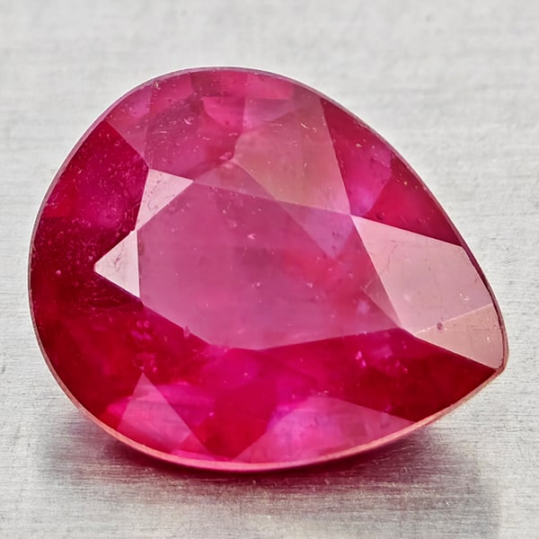 Natural Natural Purplish Red Ruby 2.60 Ct. Pear Shape 9.5 x 7.8 Mm Gemstone From Madagascar: Product ID: 805935570 Product Name: Natural Ruby Weight: 2.60 CT. Size: 9.5 x 7.8 x 4.5 MM. Shape: Pear Shape Color: Purplish Pink Clarity:VSI - SI1 Luster: Good Gems Origin: Madagascar Treatment: Hea