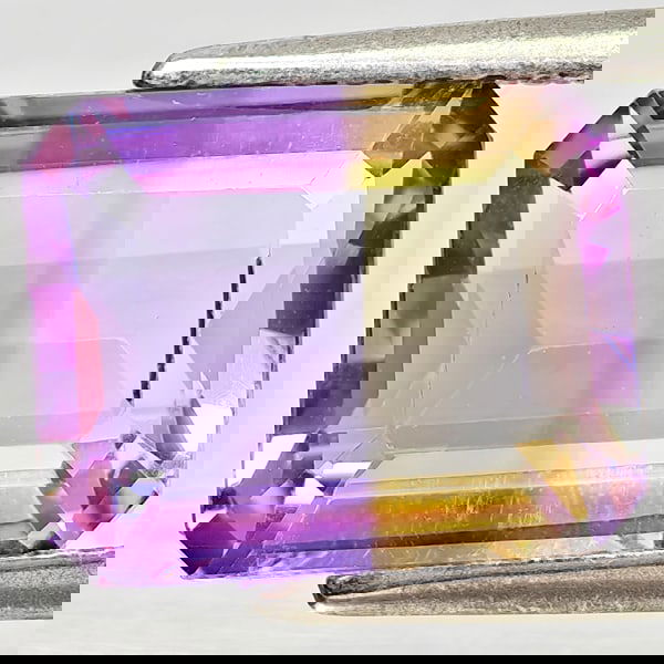 Natural Bi Color Ametrine 3.11 Ct. Octagon Shape 10 x 8.1 Mm Gemstone From Bolivia: Product ID: 800408385 Product Name: Natural Ametrine Weight: 3.11 CT. Size: 10 x 8.1 x 4.9 MM. Shape: Octagon Color: Bi Color Clarity:VSI Luster: Good Gems Origin: Bolivia Treatment: Unheated Crystal