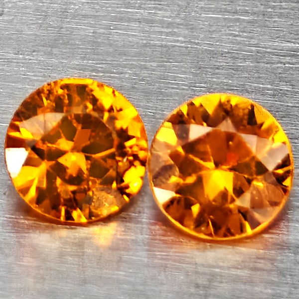 Natural Orange Yellow Sapphire 0.31 Ct. 2 Pcs Round Diamond Cut 2.9 Mm Gemstones From Thailand: Product ID: 806162870 Product Name: Natural Yellow Sapphire Weight: 0.31 CT. Size: 2.9 x 2.9 x 1.8 MM. Shape: Round Diamond Cut Color: Orange Yellow Clarity:SI1 Luster: Good Gems Origin: Thailand Trea