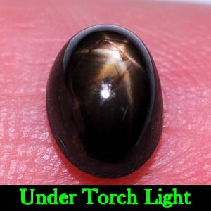 Natural Black Star Sapphire 2.12 Ct. Oval Cabochon Shape 7.4 x 5.5 Mm Gemstone from Thailand: Product ID: 806139505 Product Name: Natural Star Sapphire Weight: 2.12 CT. Size: 7.4 x 5.5 x 4.6 MM. Shape: Oval Cabochon Color: Black Clarity:Opaque Luster: Good 6 Rays Star Gems Origin: Thailand Tre