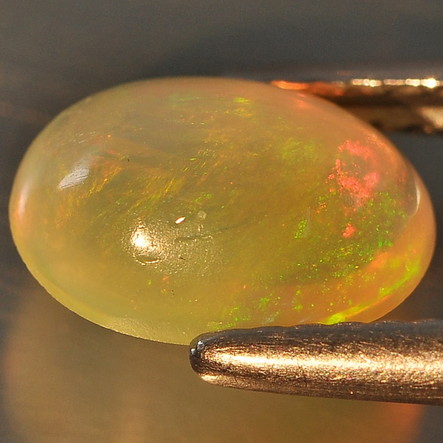 Natural Multi Color Opal 1.05 Ct. Oval Cabochon Shape 8.9 x 6.3 Mm Gemstone from Ethiopia (1 of 3)