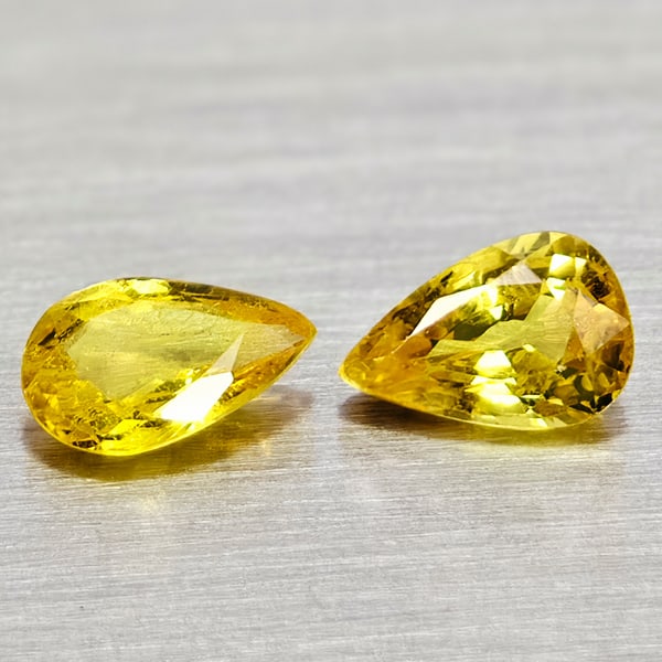 Natural Yellow Songea Sapphire 0.95 Ct. 2 Pcs Pear Shape Gemstones From Tanzania: Product ID: 806162327 Product Name: Natural Yellow Sapphire Weight: 0.95 CT. Size: 6.1 x 3.9 x 2.1 MM. Shape: Round Diamond Cut Color: Yellowish Green Clarity:VSI - SI1 Luster: Good Gems Origin: Tanza
