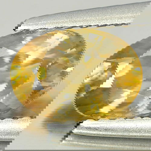 Natural Yellow Zircon 1.34 Ct. VVS Oval Shape 7 x 5 Mm. Gemstone From Cambodia: Product ID: 807728742 Product Name: Natural Zircon Weight: 1.34 CT. Size: 7 x 5 x 3.6 MM. Shape: Oval Color: Yellow Clarity:VVS Luster: Very Good Gems Origin: Cambodia Treatment: Heated Crystal Struct