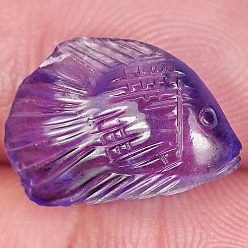 Natural Violet Amethyst 6.62 Ct. Fish Carving Shape 16.6 x 11.5 Mm Gemstone from Brazil: Product ID: 810303402 Product Name: Natural Amethyst Weight: 6.62 CT. Size: 16.6 x 11.5 x 6.4 MM. Shape: Fish Carving Color: Violet Clarity:Semi - Transparent Luster: Good Gems Origin: Brazil Treatmen