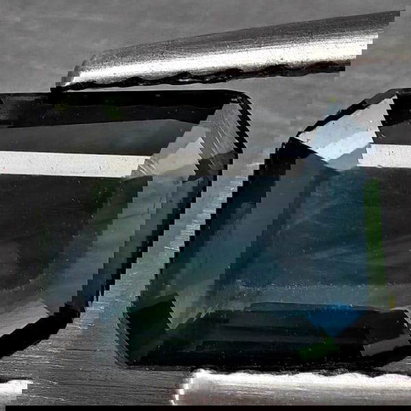 Natural Greenish Blue Sapphire 0.95 Ct. Octagon Shape 7.6 x 5.7 Mm Gemstones From Thailand: Product ID: 806130422 Product Name: Natural Green Sapphire Weight: 0.95 CT. Size: 7.6 x 5.7 x 2 MM. Shape: Octagon Color: Greenish Blue Clarity:SI1 Luster: Good Gems Origin: Thailand Treatment: Heated