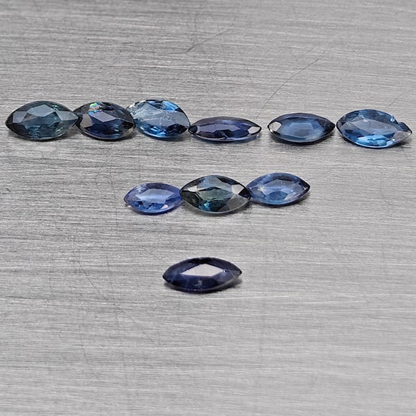Natural Blue Sapphire 0.79 Ct. 10 Pcs Marquise Shape 3.5 x 1.8 Mm Gemstones from Thailand: Product ID: 806130427 Product Name: Natural Blue Sapphire Weight: 0.79 CT. Size: 3.5 x 1.8 x 1.3 MM. Shape: Marquise Shape Color: Blue Clarity:SI1 Luster: Good Gems Origin: Thailand Treatment: Heated