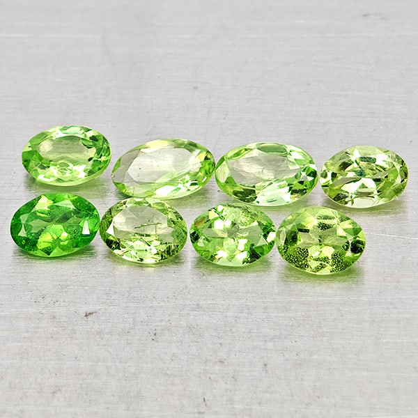 Natural Green Tsavorite Garnet 1.56 Ct. 8 Pcs Oval Shape Gemstone From Tanzania: Product ID: 803005081 Product Name: Natural Tsavorite Weight: 1.56 CT. Size: 4.9 x 3 x 1.5 to 4 x 3 x 1.7 MM. Shape: Oval Shape Color: Green Clarity:SI Luster: Good Gems Origin: Tanzania Treatment: Un